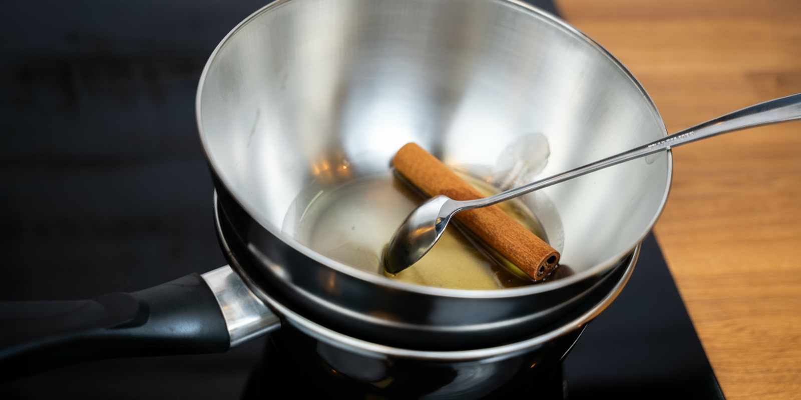 Heat the honey and stir it gently